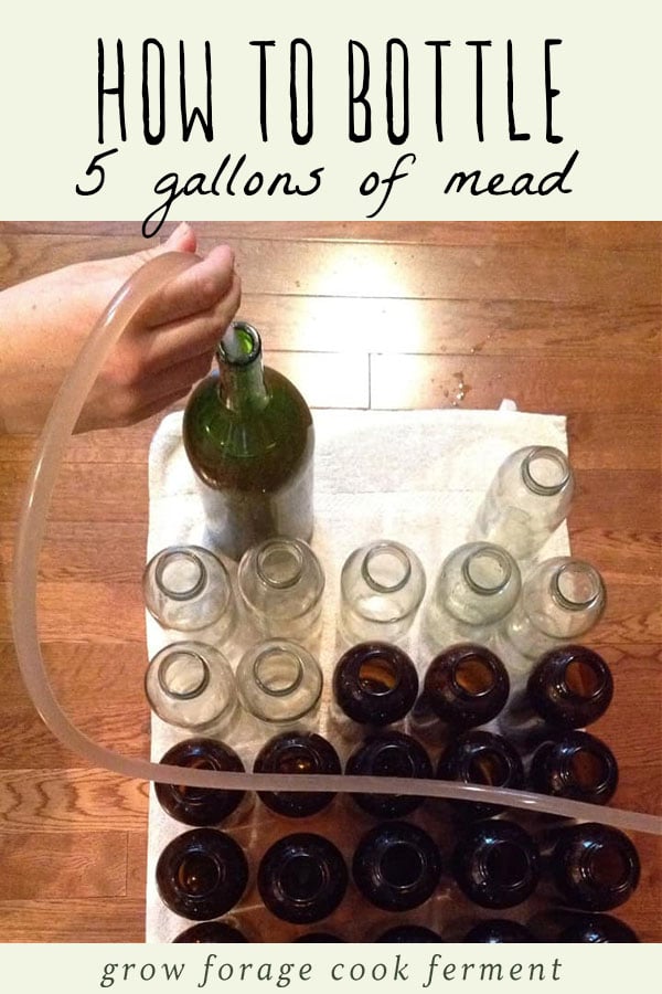 Bottling mead for storage.