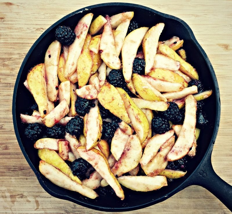 skillet with pears and blackberries