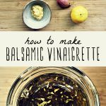 The ingredients for homemade balsamic vinaigrette on a cutting board, and a jar of homemade balsamic vinaigrette.