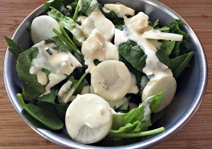 blue cheese dressing on a salad