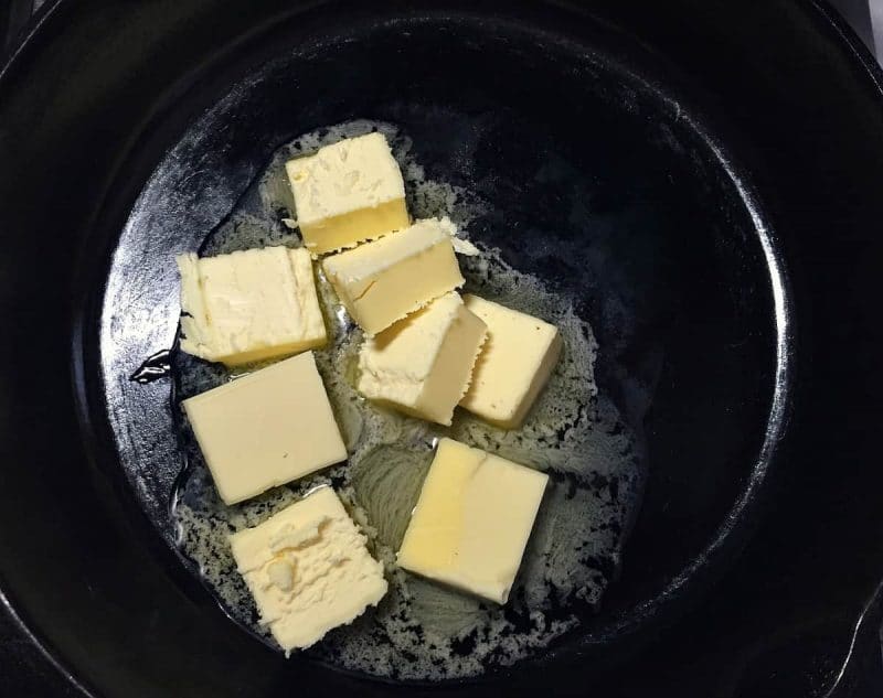 melting butter in a cast iron skillet