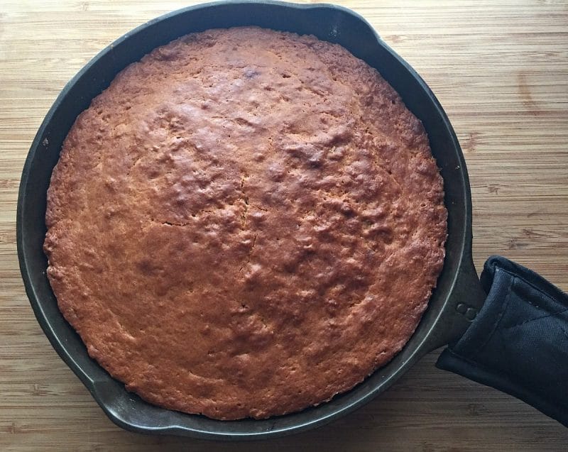 baked plum caked in cast iron skillet