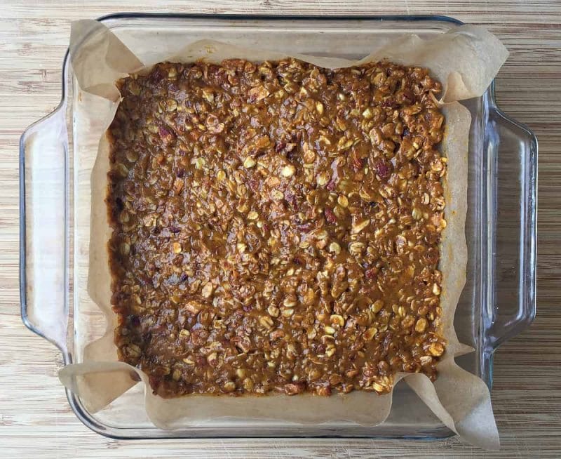 pumpkin granola bars pressed into a pan