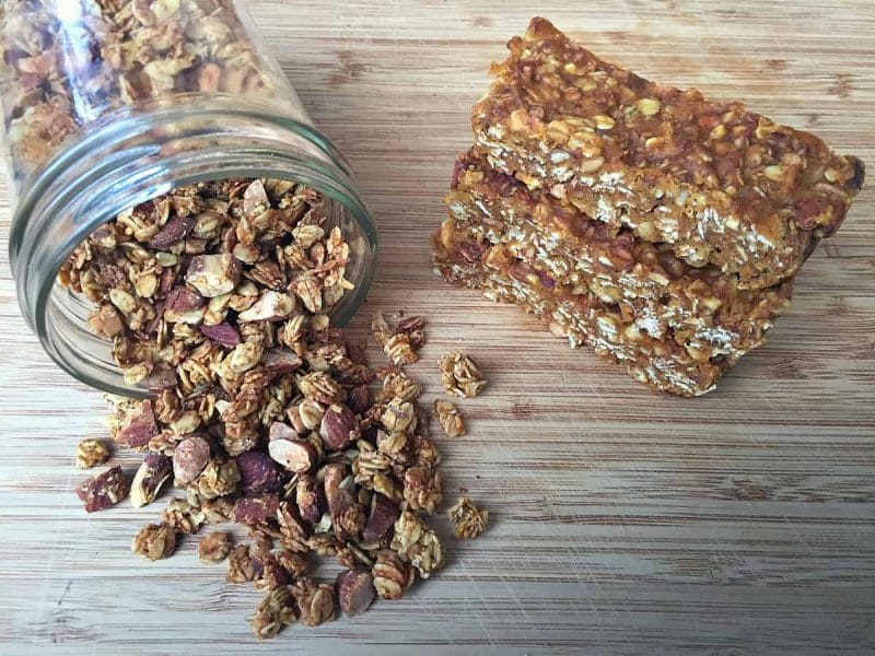 pumpkin granola in a jar and granola bars stacked up