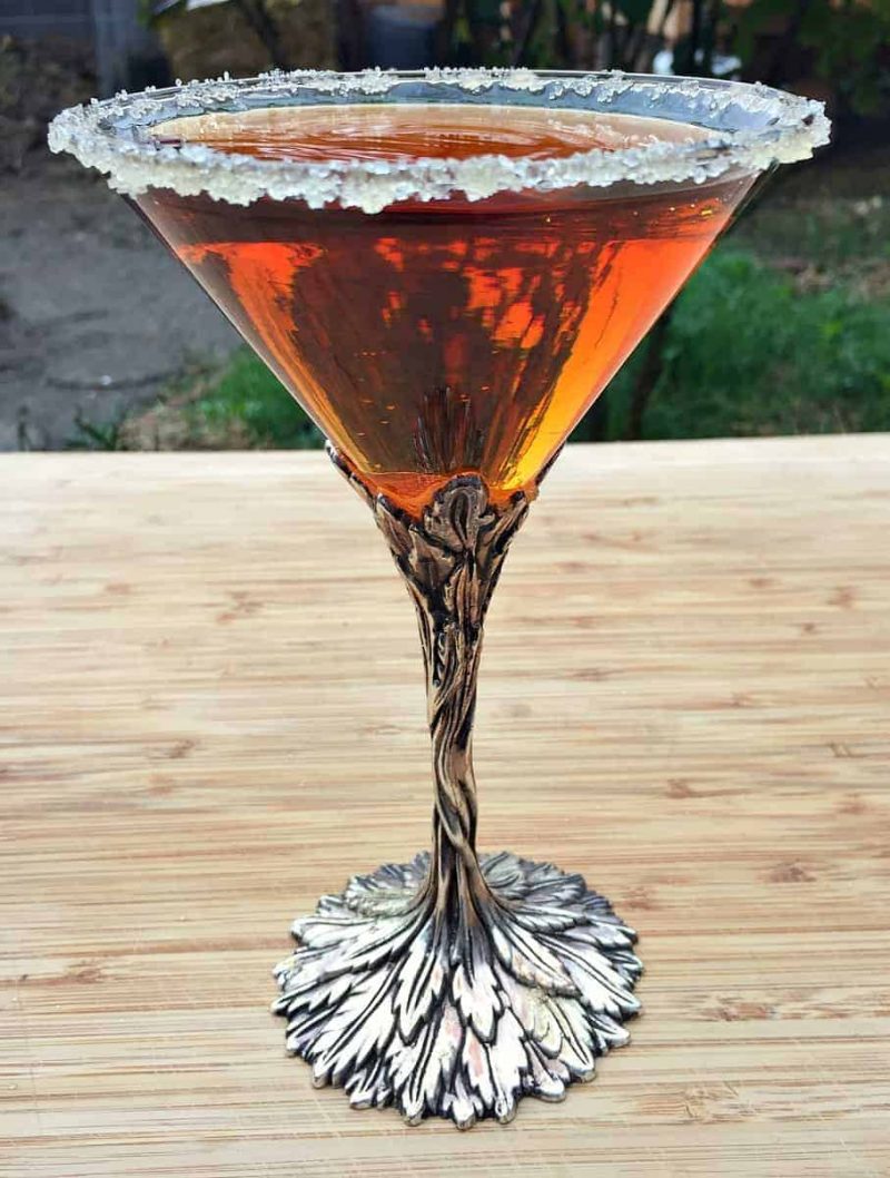 conifer infused vodka in a martini glass