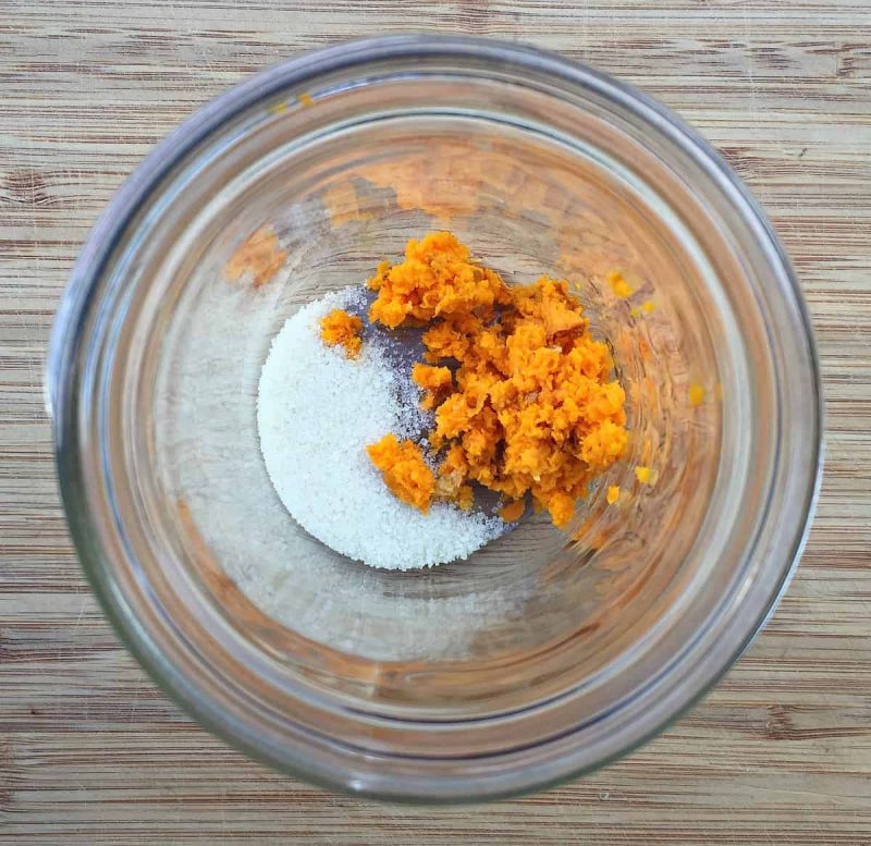 add sugar to jar with grated turmeric root