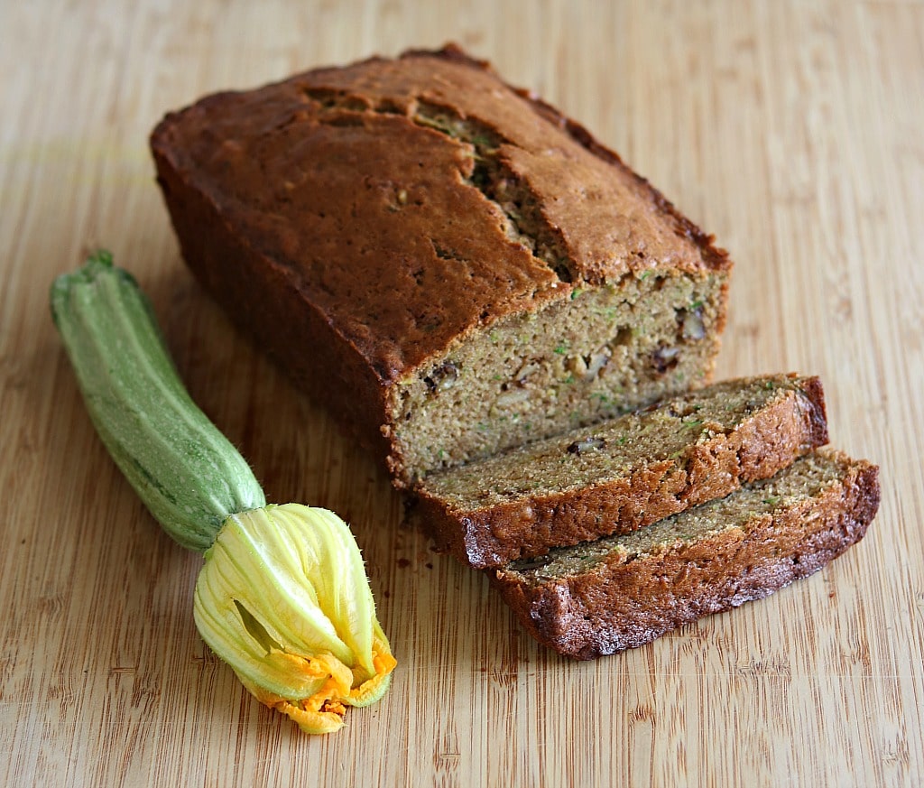 a loaf of sliced zucchini spice bread