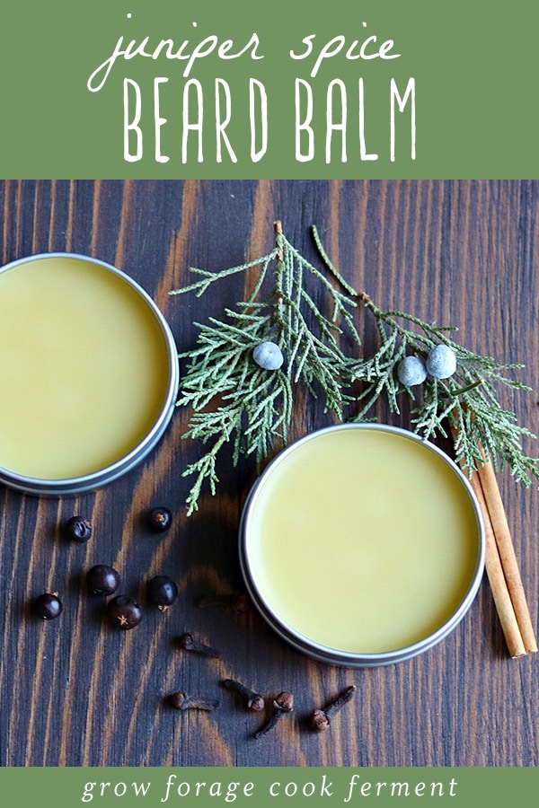 Two tins of homemade juniper spiced beard balm.