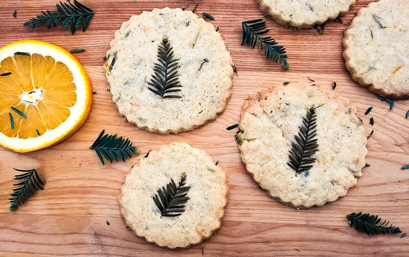 redwood needle shortbread cookies on a wooden board