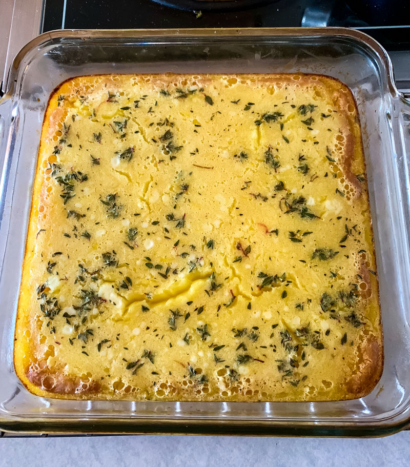 lemon bars with thyme in glass baking dish