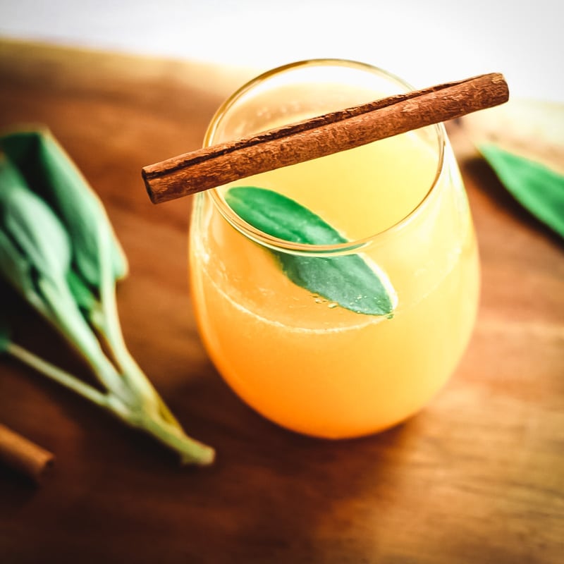 persimmon cocktail with sage and cinnamon