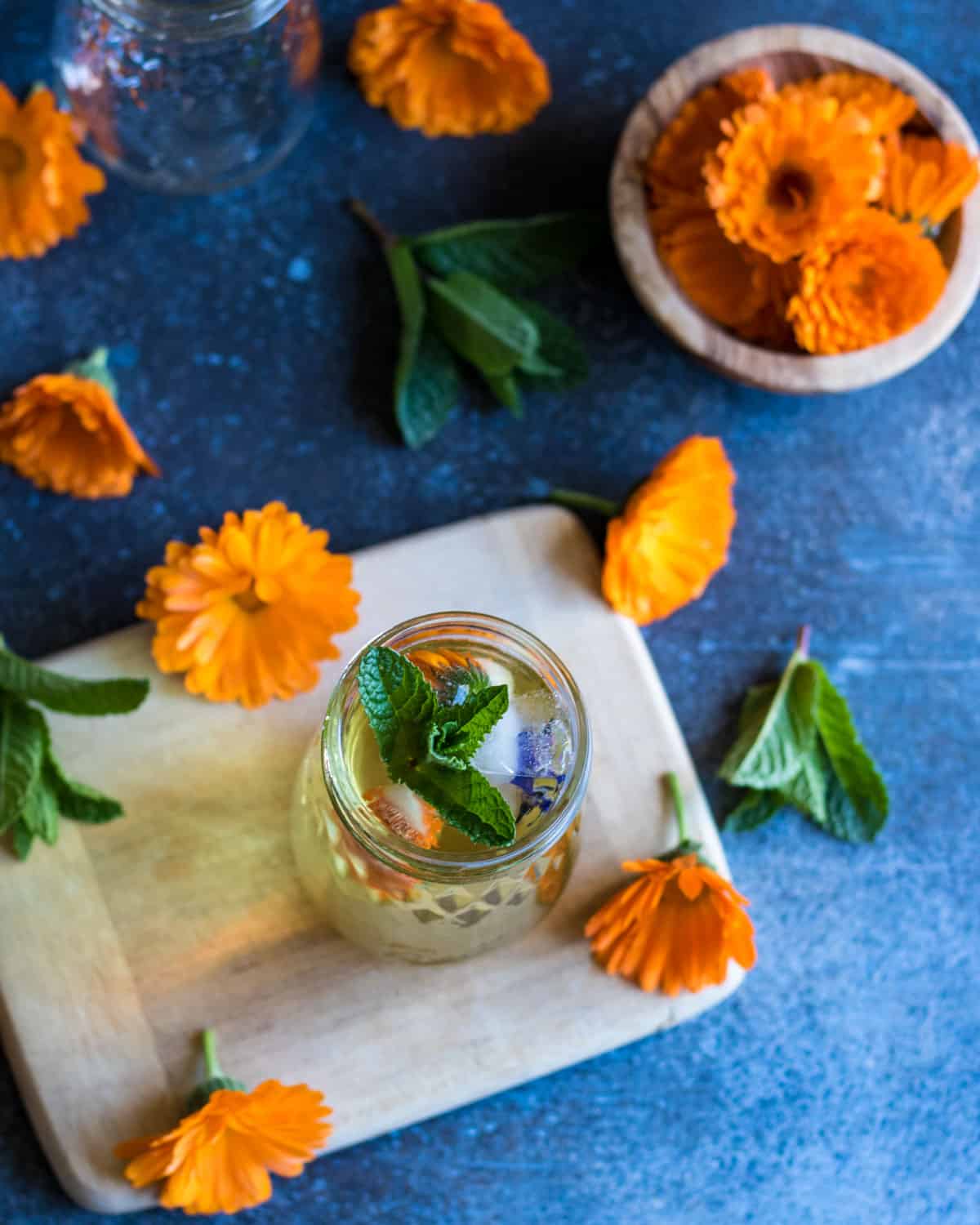 top view of calendula tea with a mint sprig