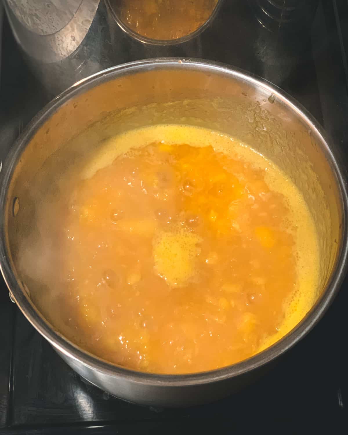 boiling the peach jam