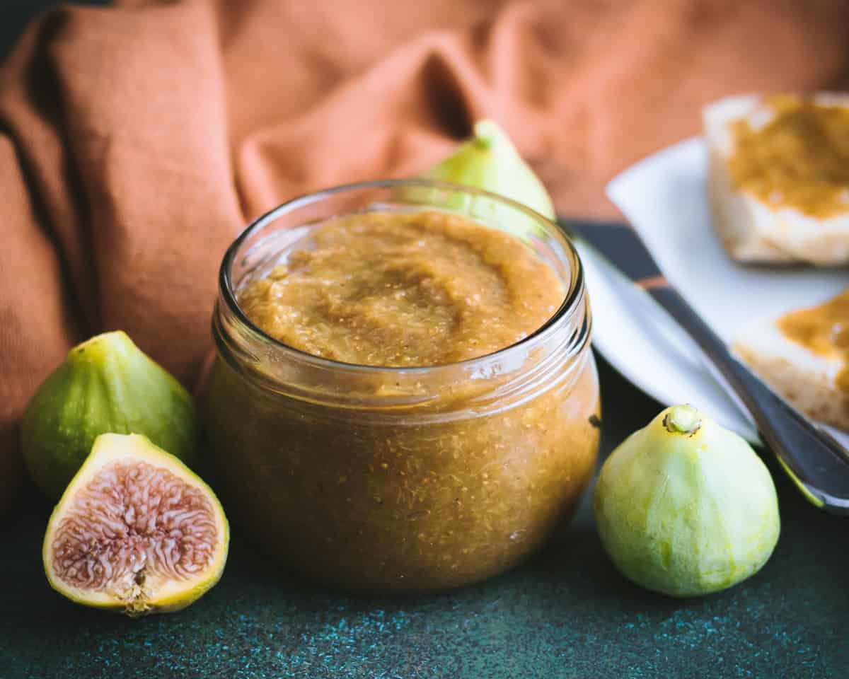 a close of of a jar of fig honey butter