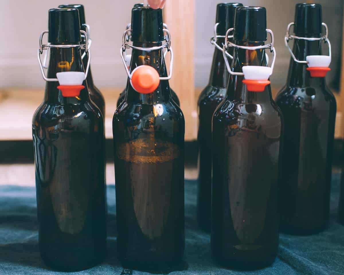 bottles being filled with hard cider