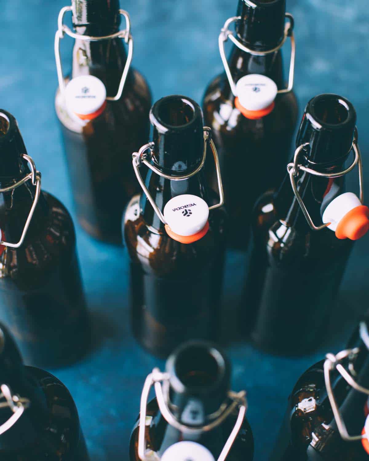 flip top bottles on a table