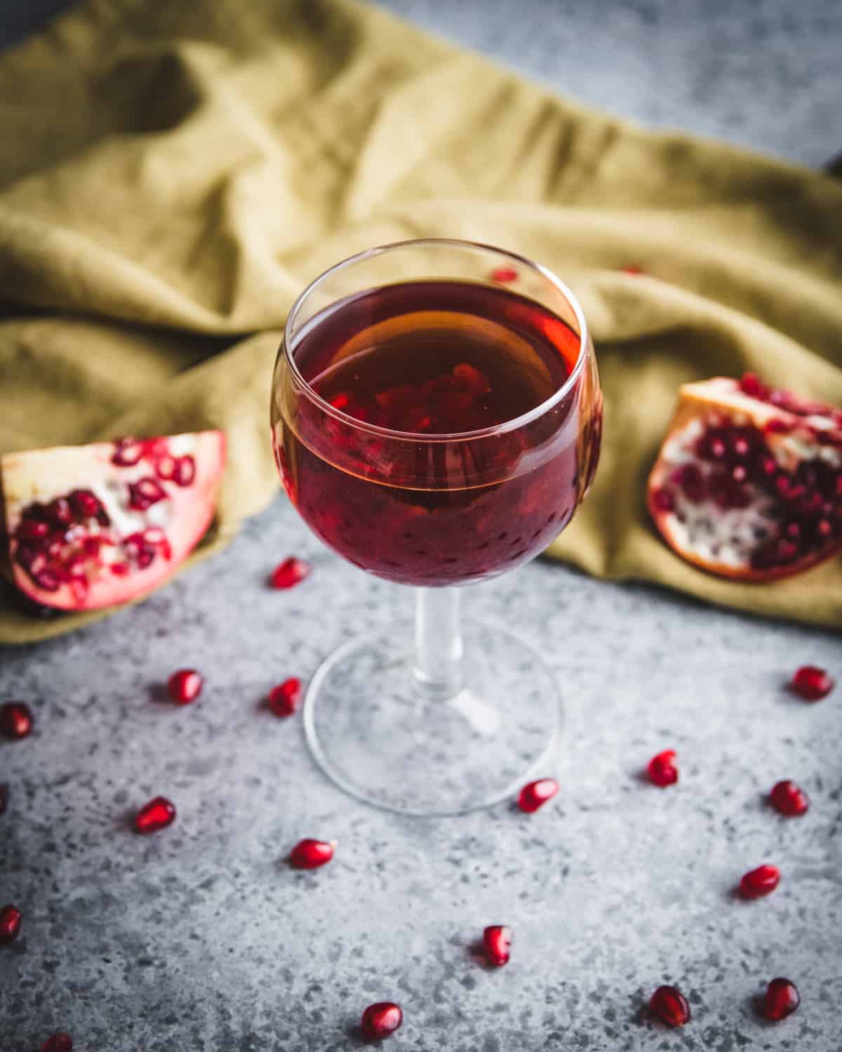 top view of a glass of red pomegranate wine