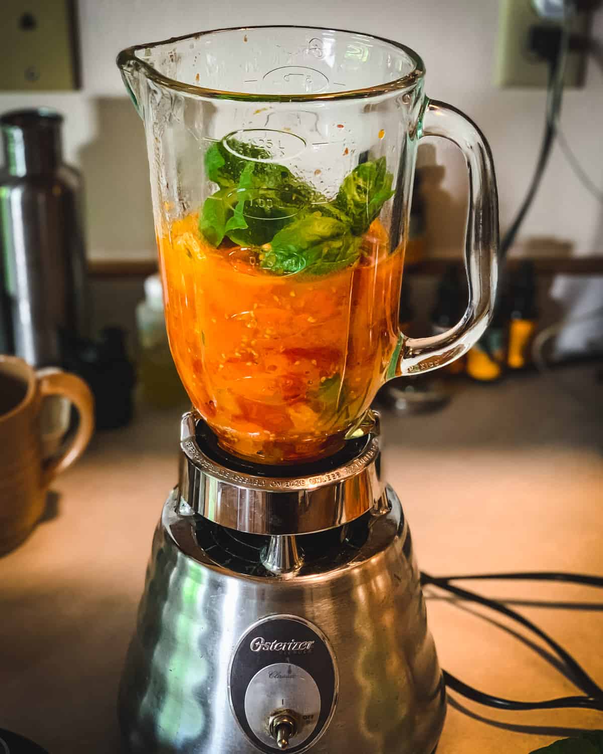 roasted tomates and basil in a blender